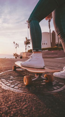 How to take a nice picture of a girl skateboarding.